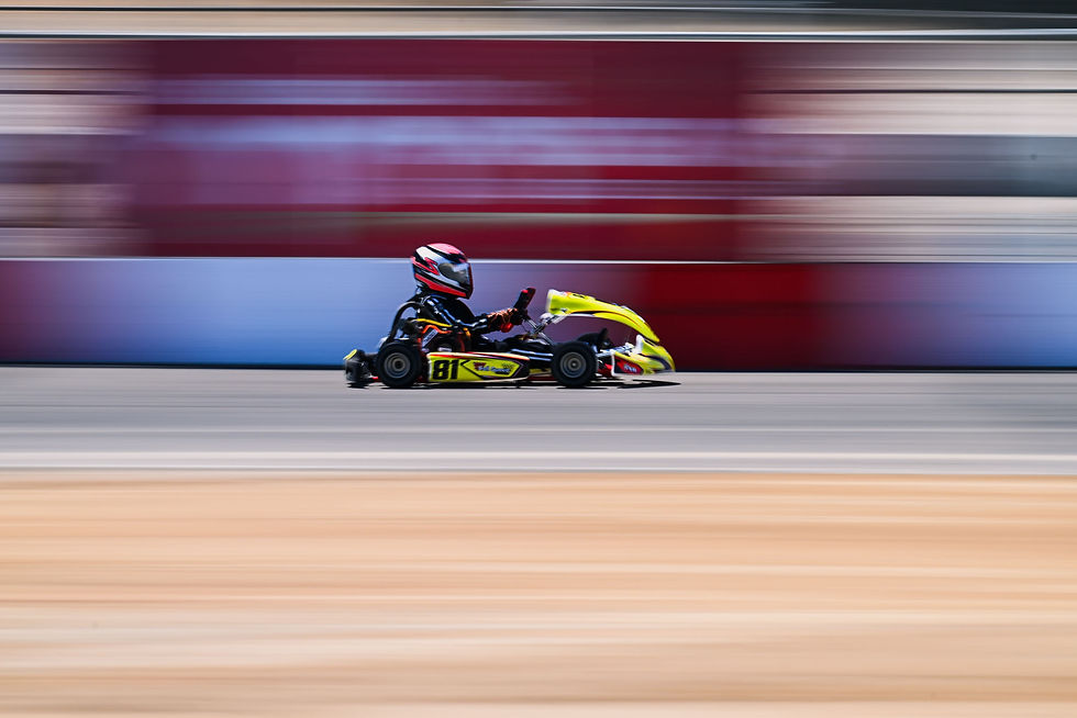 Karting on race track with motion blur