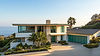 home-with-green-garage-palm-trees-background.jpg