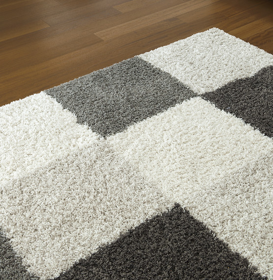 Carpet on Wooden Floor