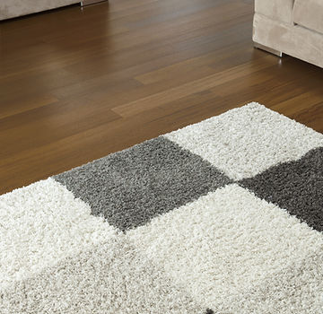 Carpet on Wooden Floor