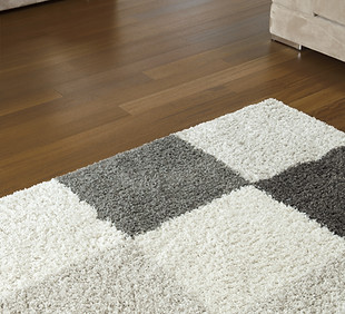Carpet on Wooden Floor