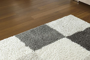 Carpet on Wooden Floor