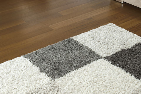 Carpet on Wooden Floor