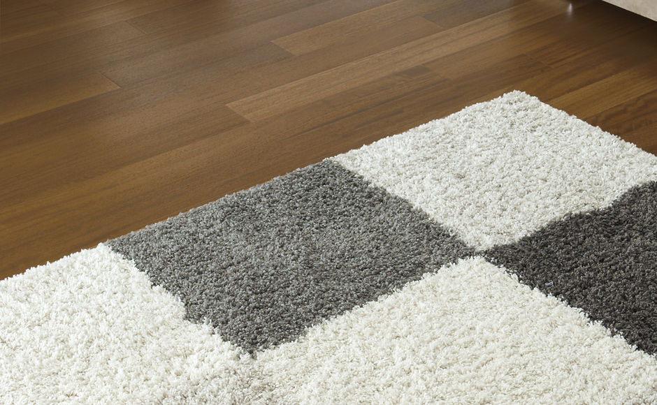 Carpet on Wooden Floor