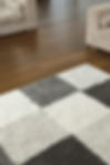 Carpet on Wooden Floor