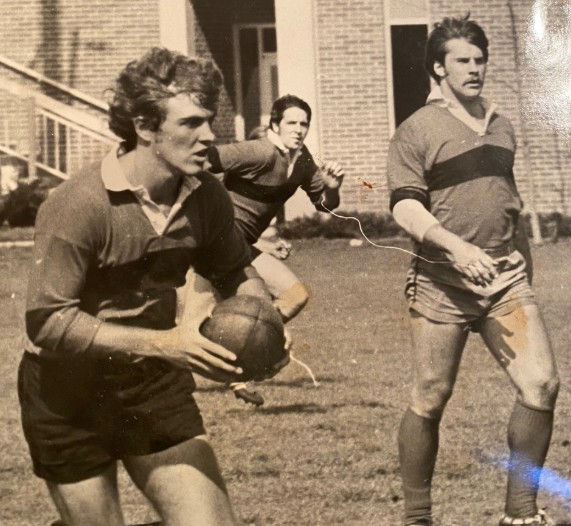 Burke Hayes (with ball) with fellow hall of fame members Dr. Jim Wynn (center) and Warren Muir.