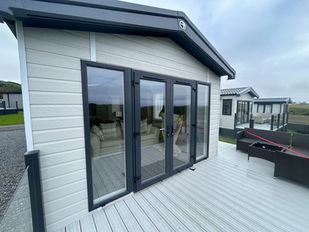 Static caravan twin sliding patio doors.
