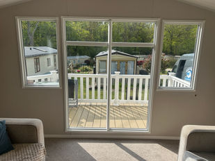 Static caravan sliding patio door conversion.