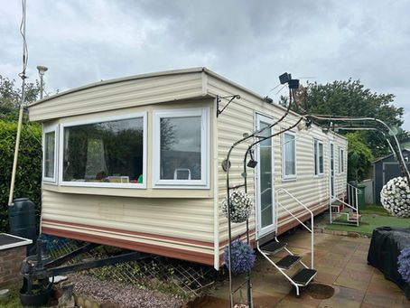 Static Caravan Refurbishment, New External Vinyl Cladding Installation in Estate Grey
