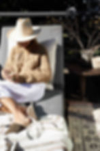 Woman lounging in a sunny winter spot