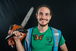 Emerald Tree Care owner Felipe Rendon with chainsaw