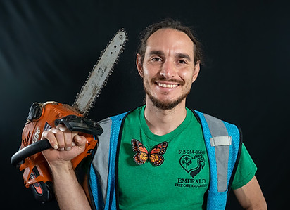 Emerald Tree Care owner Felipe Rendon with chainsaw