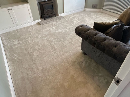 Light coloured carpet in a living room with simple decor