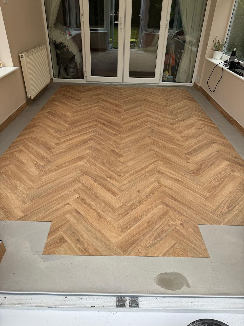 LVT on the skirting boards with silver capping