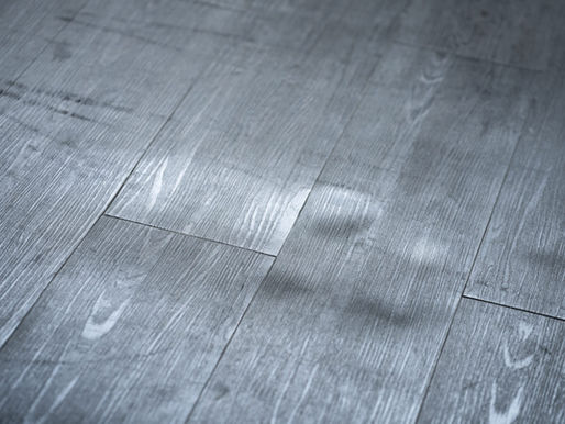 Bubbled LVT flooring due to poor sub-floor preparation