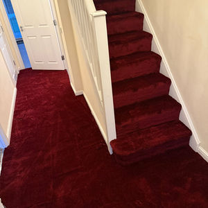 Lifestyle Molto Bella Allora carpet in a hallway and stairs