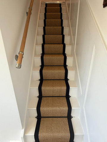 Sisal stair runner with black taped edges