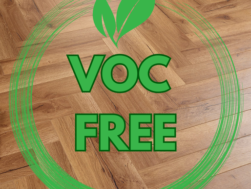 Looking down on LVT flooring with a VOC free sign