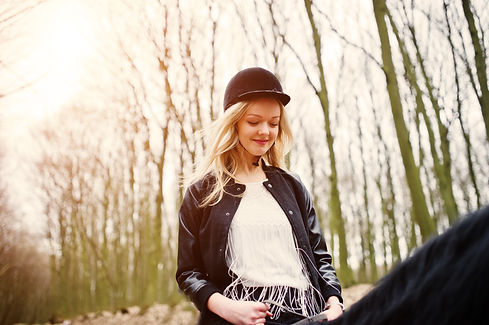 young-stylish-blonde-girl-riding-horses-autumn-forest.jpg