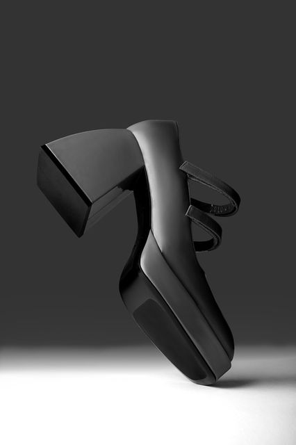 Commercial product photography of luxury shoes showcasing dramatic studio lighting in Adelaide.