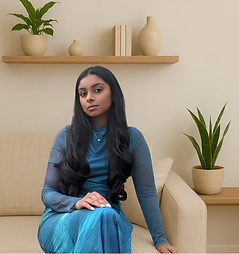 Registered Psychotherapist (Qualifying) Zahrah Ally smiling in a calm welcoming environment