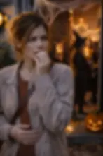 Adult standing outside a Halloween party feeling anxious and unsure about going inside