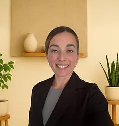 Registered Psychotherapist (Qualifying) Meagan Benhaim smiling in a calm welcoming environment