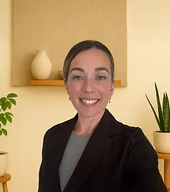 Registered Psychotherapist (Qualifying) Meagan Benhaim smiling in a calm welcoming environment