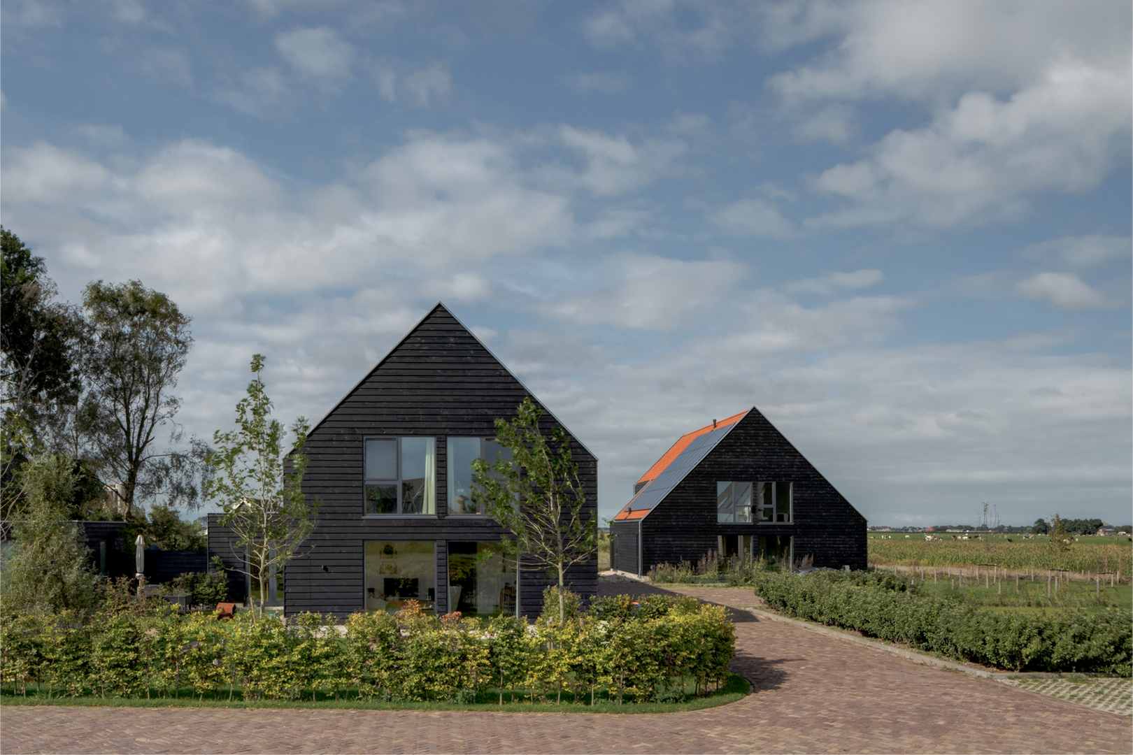 Fotografie van duurzaam woonproject – relatie tussen gebouw en omgeving