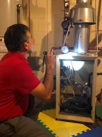 Inspector Mark Krenisky inspecting furnace