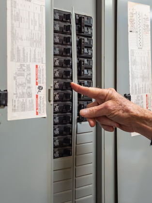 Inspector Christopher checking the electrical 