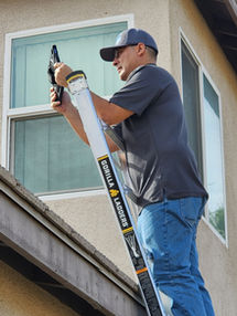 Inspector Gerardo Diaz inspecting in a roof