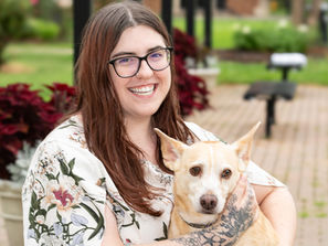 Photo of MCH staff member with pet.