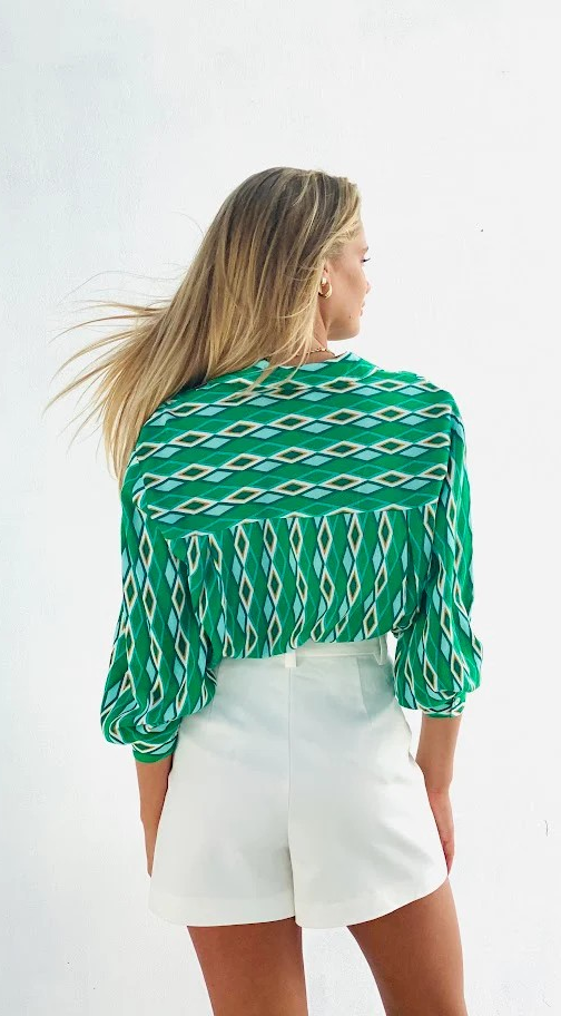 Thumbnail: white, high waisted women's shorts. back view.