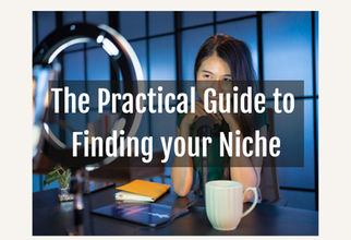 Smiling woman at desk with microphone, ring light, tablet, and mug. Text: The Practical Guide to Finding Your Niche.