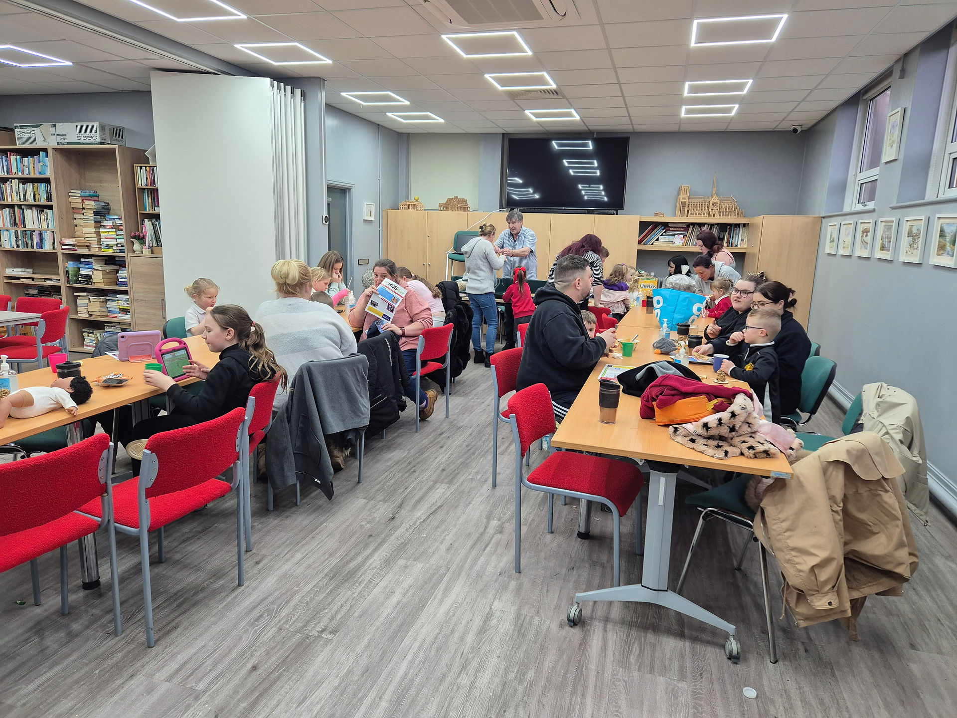 The Hub South Shore | Tea Time Hub | Families eating together