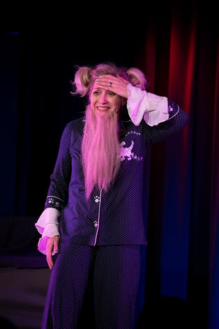 Leslie in pajamas and beard