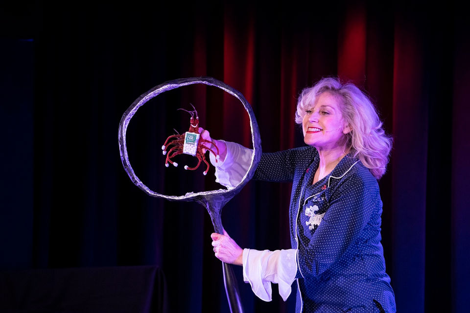 Leslie performing on stage