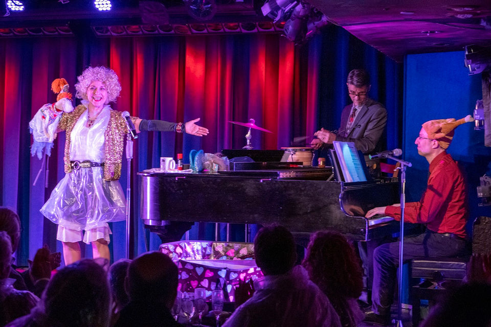 Leslie, Lolly and piano on stage