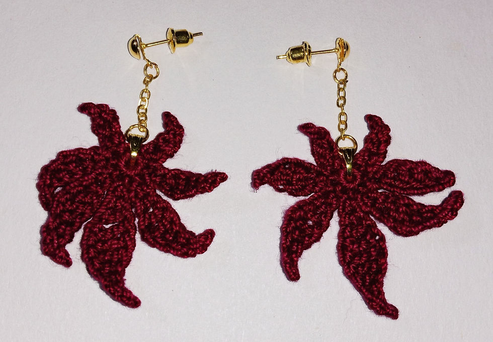 Thumbnail: Autumn's Embrace: Maple Leaf Crochet Earrings