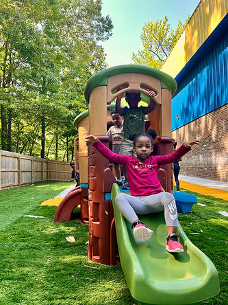 preschool kids playing at school playground