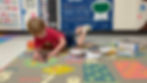 2 year old playing with a puzzle in summer preschool program at Blue Ribbon Results Academy