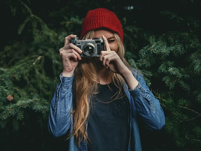 a woman taking photos