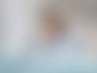 a woman tired at her desk