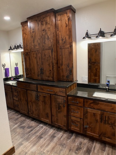 New, stain grade, knotty alder cabinets with shaker doors and drawers