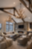 Two large custom star elk antler chandeliers hanging in a luxury mountain great room with