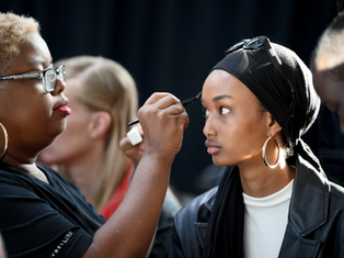 Ugbad Abdi prepares backstage during the Michael Kors Collection Spring 2020 Runway Show.