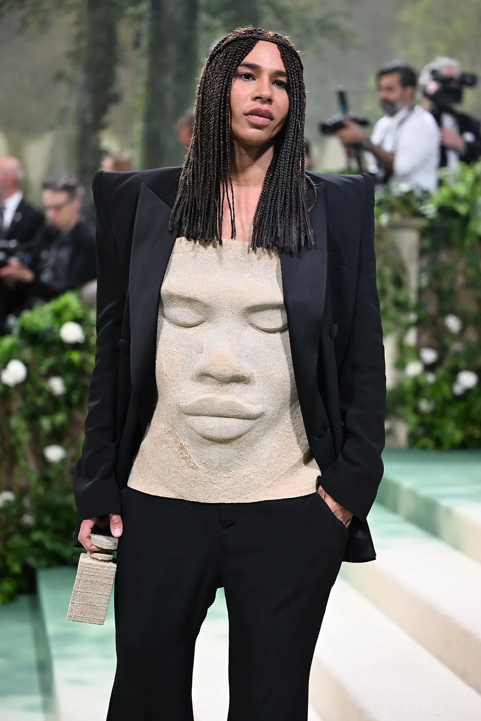 Olivier Rousteing arriving at the Met Gala in 2024 wearing a shirt with his own visage crafted in sand.Credit...Nina Westervelt for The New York Times