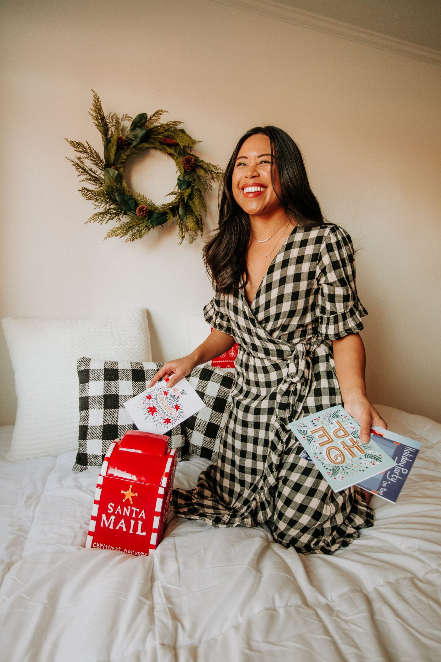 Dropping off Christmas cards to santa - sending letters to santa's mailbox - christmas photo shoot ideas at home – image from www.emmasedition.com – copyright @emmasedition 