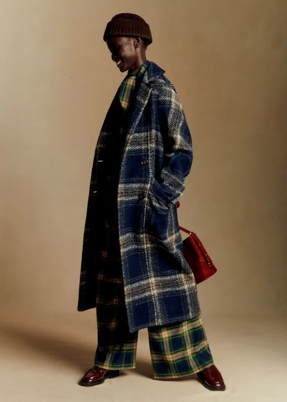 Sézane's fall collection really knocks the coat lineup out of the park. This delicious plaid coat is crafted from natural fibers and it's fully-lined: meaning it's as cozy as it is cute.